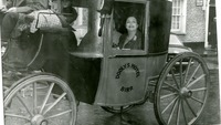 Object Jacob's representatives in a carriage outside Dooly's Hotelhas no cover