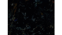 Object ISAP 11064, photograph of cross polarised thin section of stone adze/axecover
