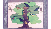 Object Wooden jigsaw of birds in a tree designed by Oisin Kellyhas no cover