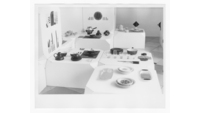 Object View of WMF kitchenware in an exhibition settingcover