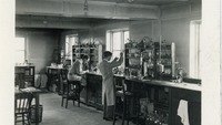 Object Male employees working in the Aintree laboratorycover picture