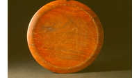 Object Wooden platter in a dark woodhas no cover picture