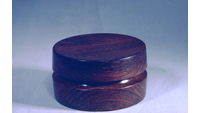 Object Round box in dark wood designed by Gerald Tylerhas no cover