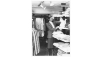 Object Woman looking at hats in fashion departmenthas no cover picture
