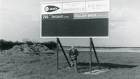 Object Jeffery Brian Jenkins standing underneath an Irish Biscuits Ltd. signcover picture