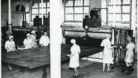 Object Female workers at a drawplate ovencover picture