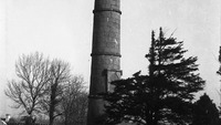 Object Round Tower [wall in foreground, railings and trees in front of tower]cover picture