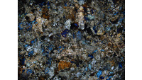 Object ISAP 03877, photograph of polarised thin section of stone axecover picture