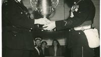 Object Presentation of a cup at a St John's Ambulance eventhas no cover picture