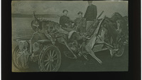 Object Glass slide: a man holding a rifle sitting in a car loaded with dead deer, with two other peoplecover picture
