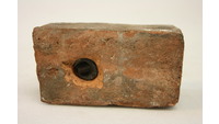 Object Bullet embedded in brickcover
