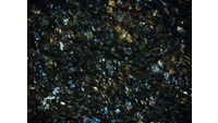 Object ISAP 03224, photograph of cross polarised thin section of stone axe/adzecover picture