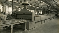 Object Jacob's Factory worker operating a travelling oven in Aintreecover picture