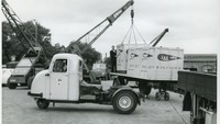 Object Ned Balfe with crates of Jacob's goods being lifted by cranehas no cover picture